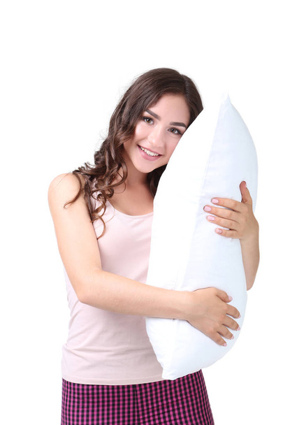 Beautiful girl holding pillow isolated on white background - Foto, Imagen