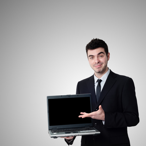 Homme d'affaires avec ordinateur portable
 - Photo, image