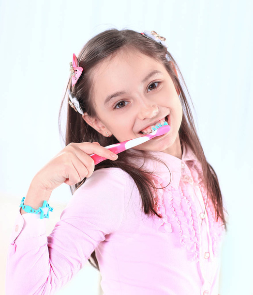 little girl with toothbrush.photo with copy space - Фото, зображення