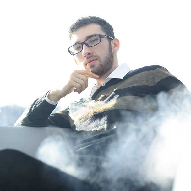 close up.businessman with a cigarette during a coffee break. - Photo, Image