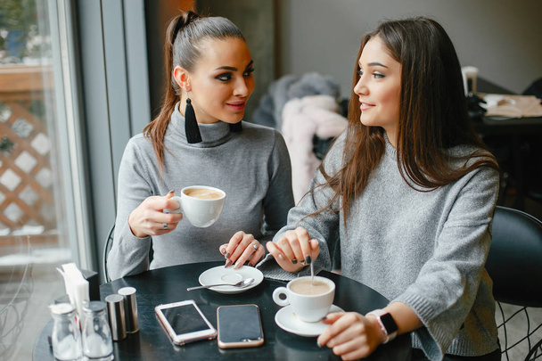 girls in a cafe - Фото, зображення