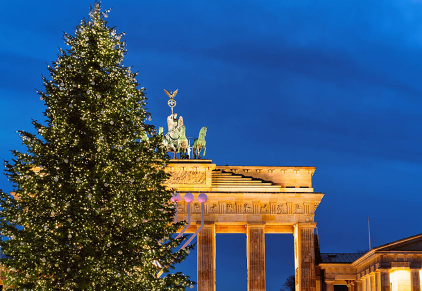 Brandenburg Gate Building of Berlin, Germany. Illuminated at night - Photo, Image