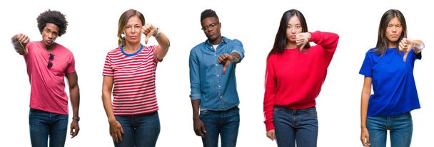 Composition of african american, hispanic and chinese group of people over isolated white background looking unhappy and angry showing rejection and negative with thumbs down gesture. Bad expression. - 写真・画像