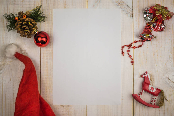 Letter to Santa Claus, Christmas toys, pen on wooden white background - 写真・画像