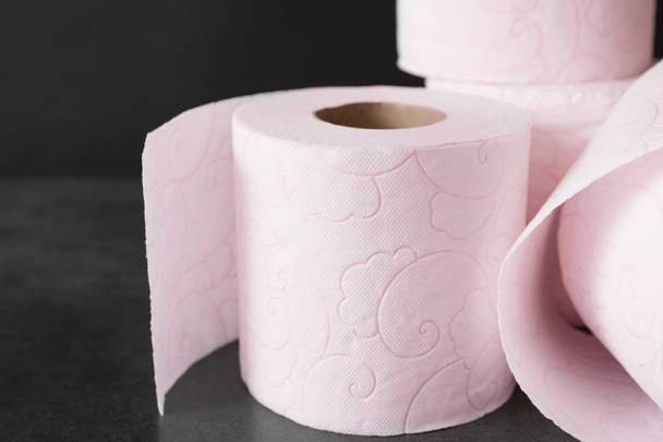 Soft toilet paper rolls on black background - Photo, Image
