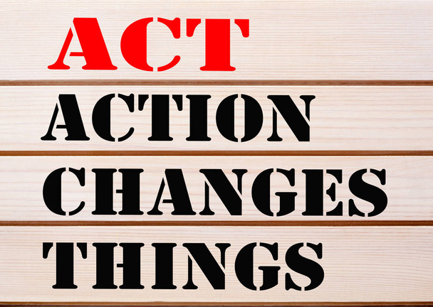 Action Changes Things (ACT) words written on wood wall decor. Business concept. - Photo, Image