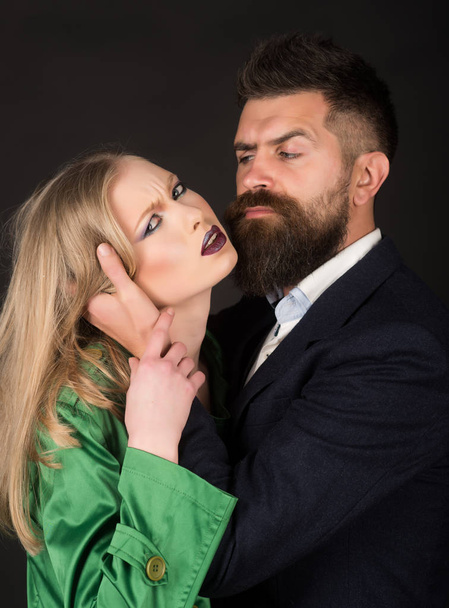 Deepening the love and intimacy. Style icons. They both love fashion. Couple in love. Bearded man hug woman with long hair. Intimate couple in fashion clothing. Fashion style and hair care - Foto, Imagen