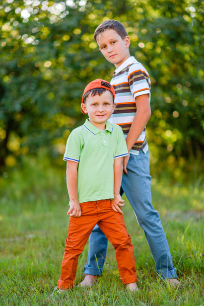Portrait of two boys in the summer outdoors - 写真・画像
