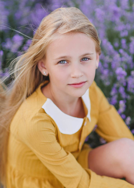 portrait of little girl outdoors in summer - Photo, Image