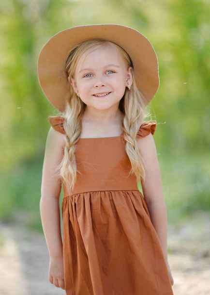 portrait of little girl outdoors in summer - Photo, image