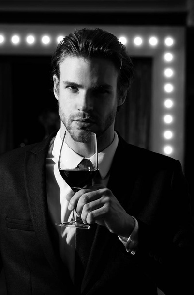sommelier or man hold wine glass, meeting and relax - Photo, image