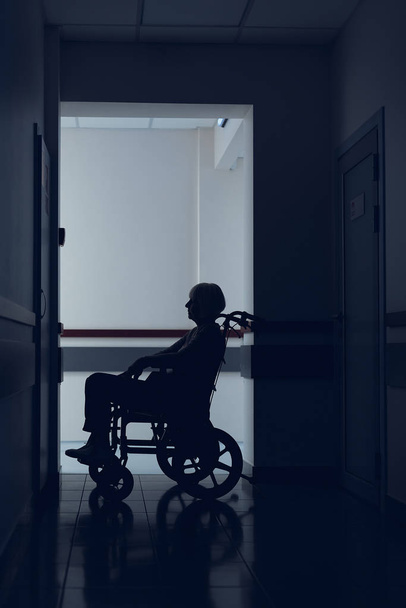 Lady on pushchair is staying at hospital - Valokuva, kuva
