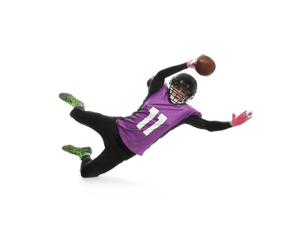 American football player catching ball on white background - Foto, afbeelding
