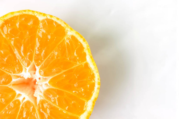 orange fruit peel on white background - Foto, afbeelding