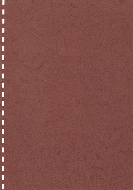 Ruskea pahvi, jossa perforaatiotausta
 - Valokuva, kuva