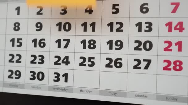 Office calendar, sticker with the inscription holiday. - Footage, Video