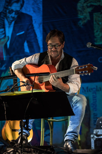 Cracow, Poland - November 2, 2018: American jazz fusion and Latin jazz guitarist Al Di Meola performing live on the Kijow.Centre stage in Krakow, Poland - Fotografie, Obrázek