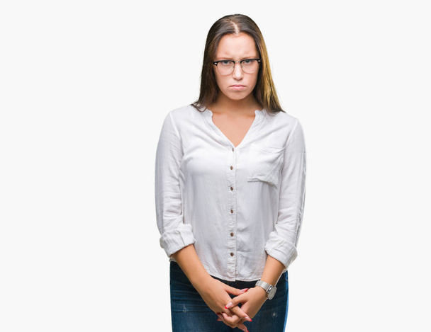 Młody biznes kaukaski kobieta z powodu problemu w okularach na na białym tle sceptykiem i rozstrój nerwowy, zmarszczenie brwi. Negatywne osoba. - Zdjęcie, obraz