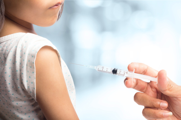 cropped shot of girl during Vaccination - Φωτογραφία, εικόνα