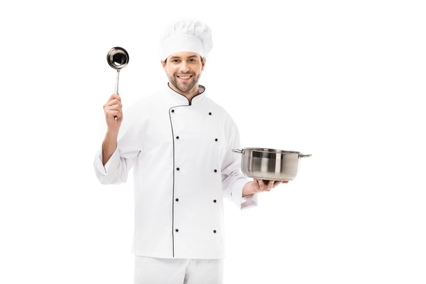 happy young chef with cooking pot and ladle isolated on white - Photo, Image