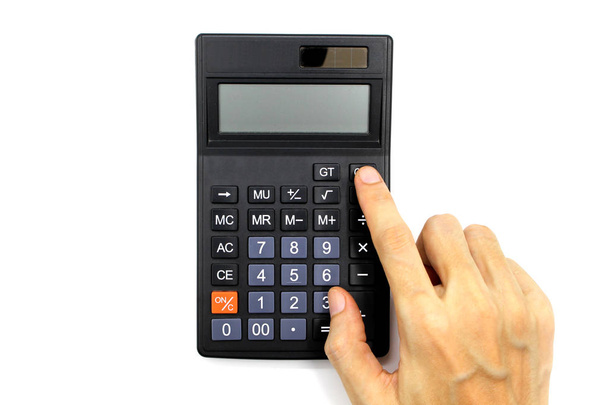 Calculadora de uso manual isolada no fundo branco
. - Foto, Imagem