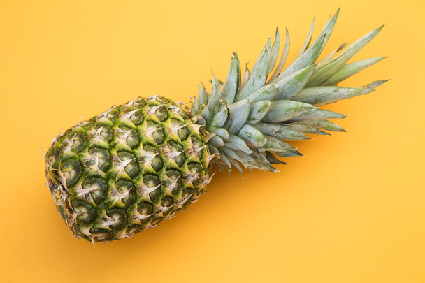 Fresh pineapple on yellow background - Foto, Bild