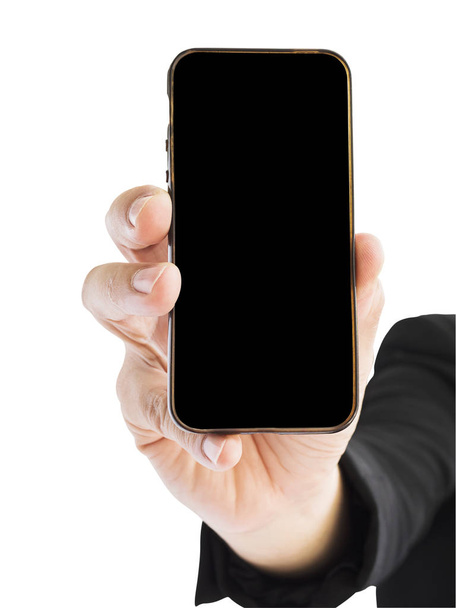 A business man is showing blank mobile phone screen. Photo is isolated over white and included clipping path. - Foto, afbeelding