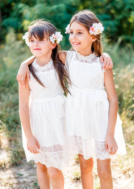 Portrait of two girls in the woods girlfriends - Foto, Imagem