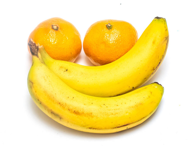 bananas and fruits on a white background - Photo, Image