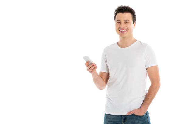 happy handsome man using smartphone isolated on white - Zdjęcie, obraz