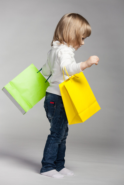Girl with two shopping bags - Фото, зображення