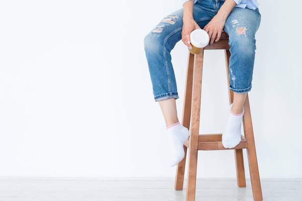 woman sitting stool coffee cup relaxed leisure - Foto, Imagem