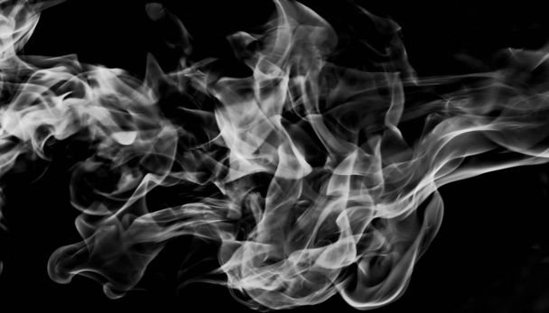 fekete alapon fehér füst tűz - Fotó, kép
