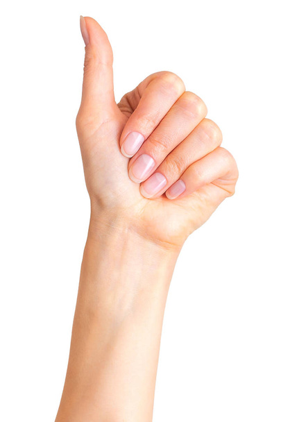 Mujer cogida de la mano en gesto de signo semejante, dando el pulgar hacia arriba
 - Foto, Imagen