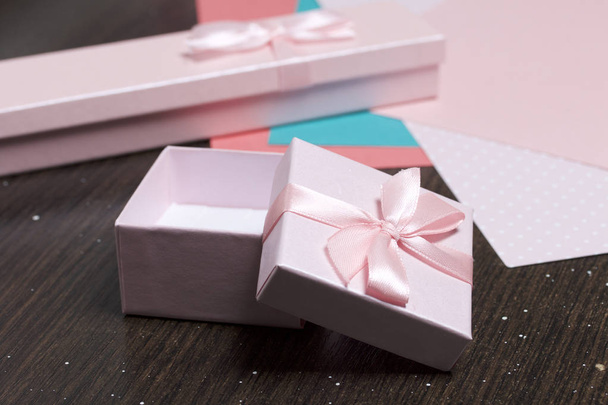Wrapping presents. Gift boxes. Color paper for packaging. - Fotó, kép