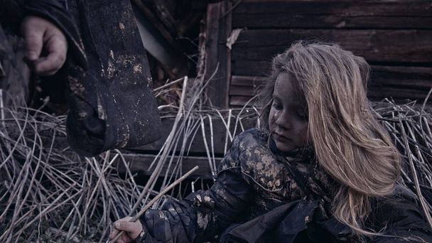 portrait of little dirty homeless kids beside abandoned building - Foto, Imagem