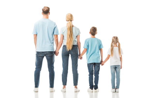 Back view of family standing and holding hands isolated on white - Фото, изображение