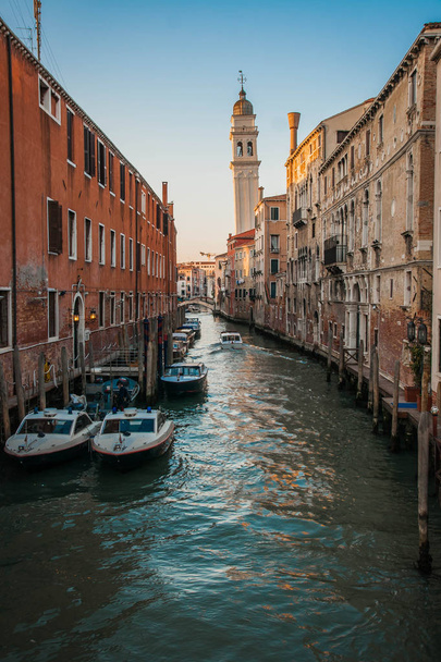 Scenic image of picturesque chanels of Venice at sunset in Italy - 写真・画像