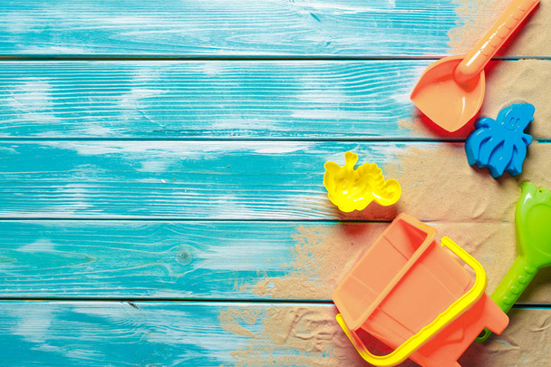 Children toys on wooden deck - Фото, зображення