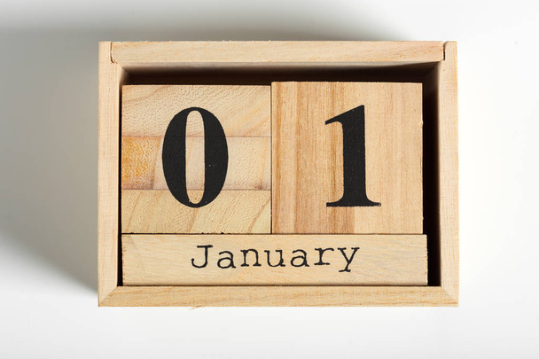 Wooden cubes with date on white background.1st of January - 写真・画像