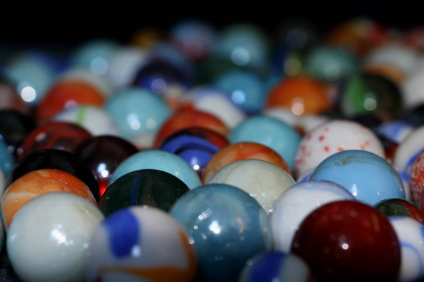Brinquedo de taw de mármore para crianças, bolas de vidro
 - Foto, Imagem