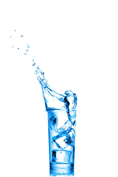 Water splashes in the glass on white background - Foto, Bild