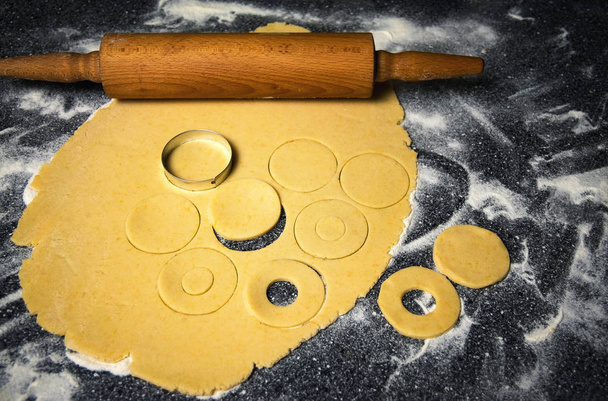 food background wood roller and dough prepared for cakes - Photo, Image