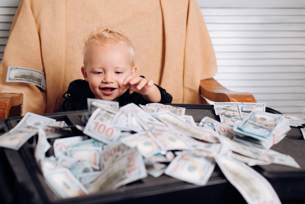 I did it. Startup business costs. Small child do business accounting in startup company. Boy child with money case. Little boy count money in cash. Little entrepreneur work in office - Foto, imagen