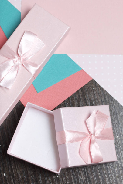 Wrapping presents. Gift boxes. Color paper for packaging. - Фото, изображение