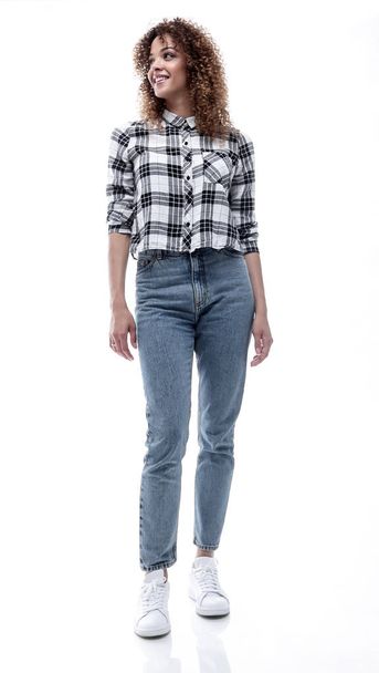 stylish young woman in plaid shirt and jeans. - Photo, image