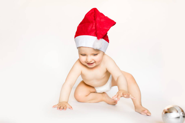Xmas card with cute baby girl in red hat - Photo, Image
