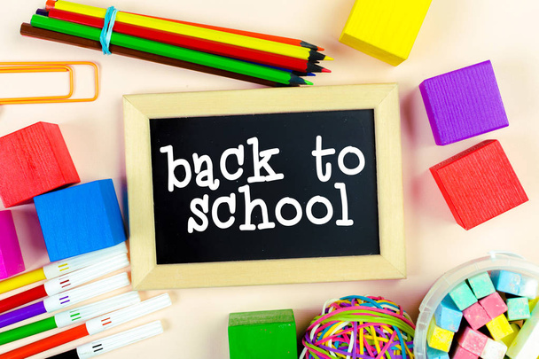 School supplies with black board. Back to school concept - Фото, зображення
