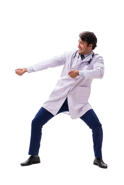 Молодой красивый доктор под давлением изолирован на белом
 - Фото, изображение