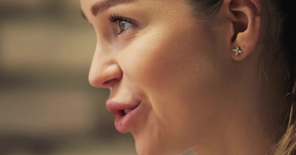 Profile of woman talking close up - Filmati, video